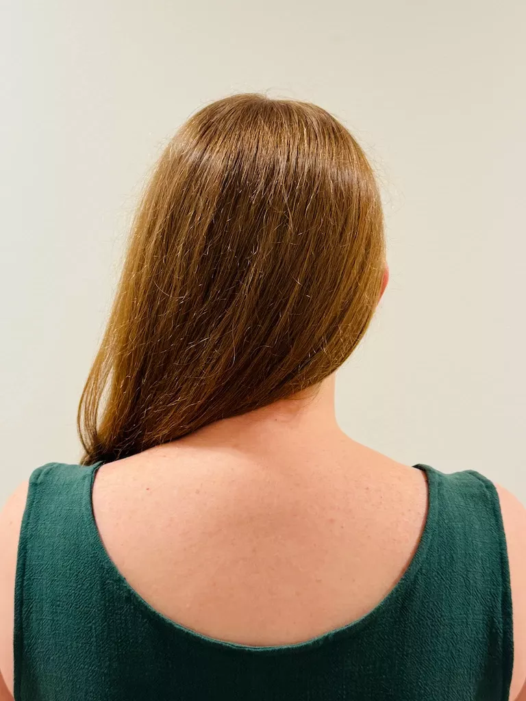 The back neckline of the green tank top. You can tell from the edges that this fabric is a little softer and drapier