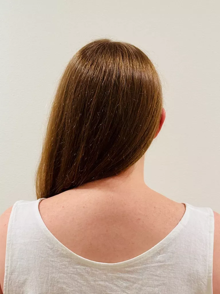 The back neckline of the white tank top. The edges look really crisp in this linen