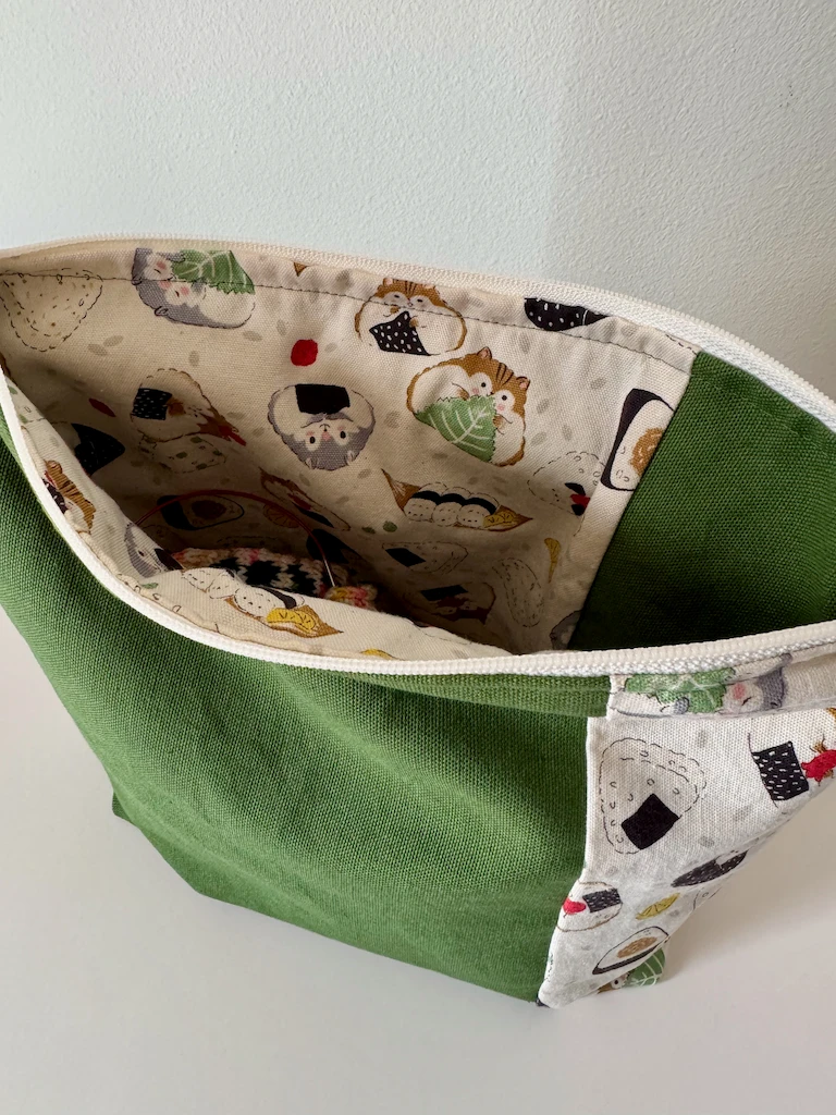 Top view of the open bag, zoomed a bit closer into the hamsters